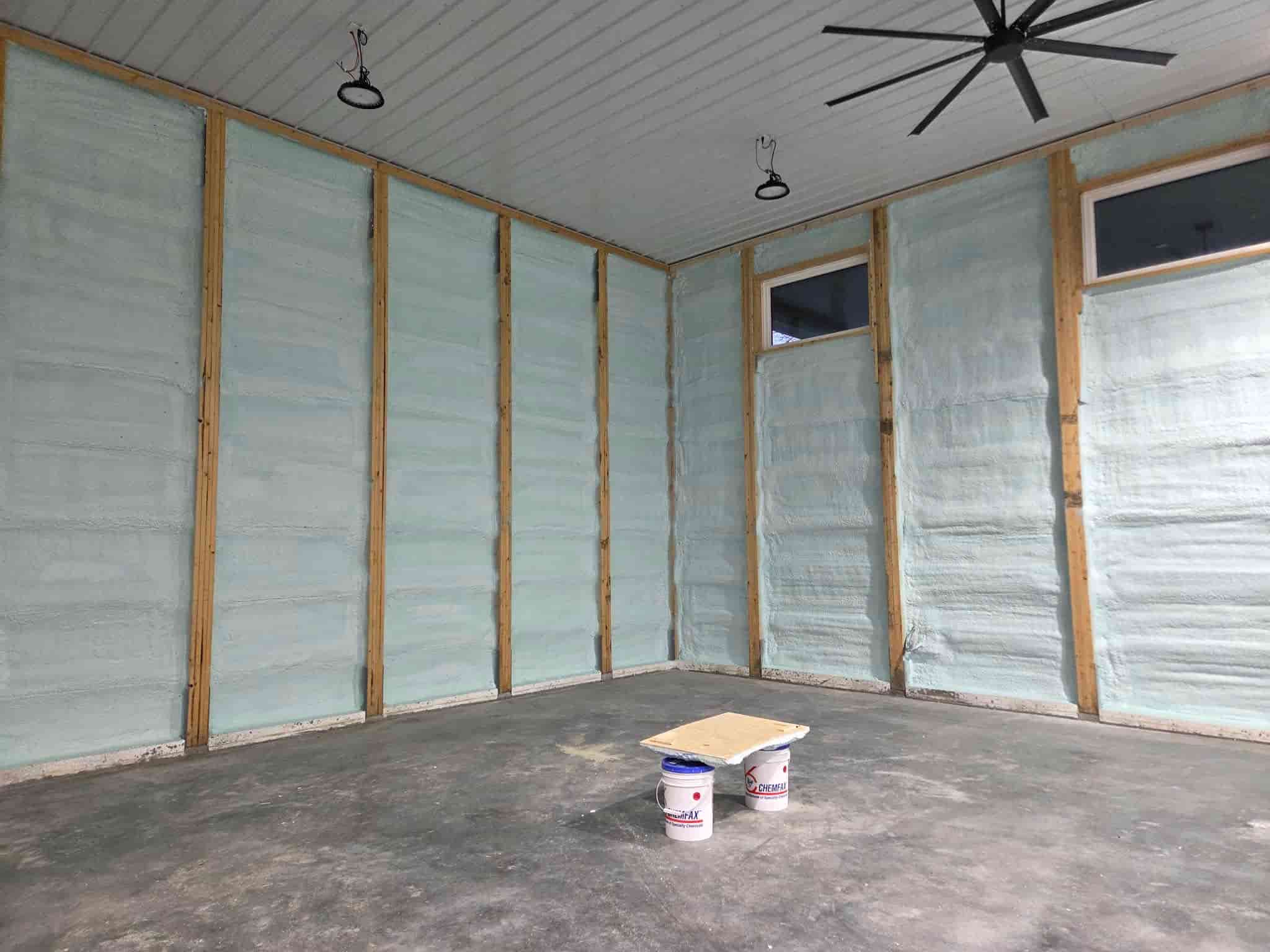 Unfinished room with exposed wall insulation, concrete floor in Calgary, AB